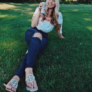 White crop top with red details